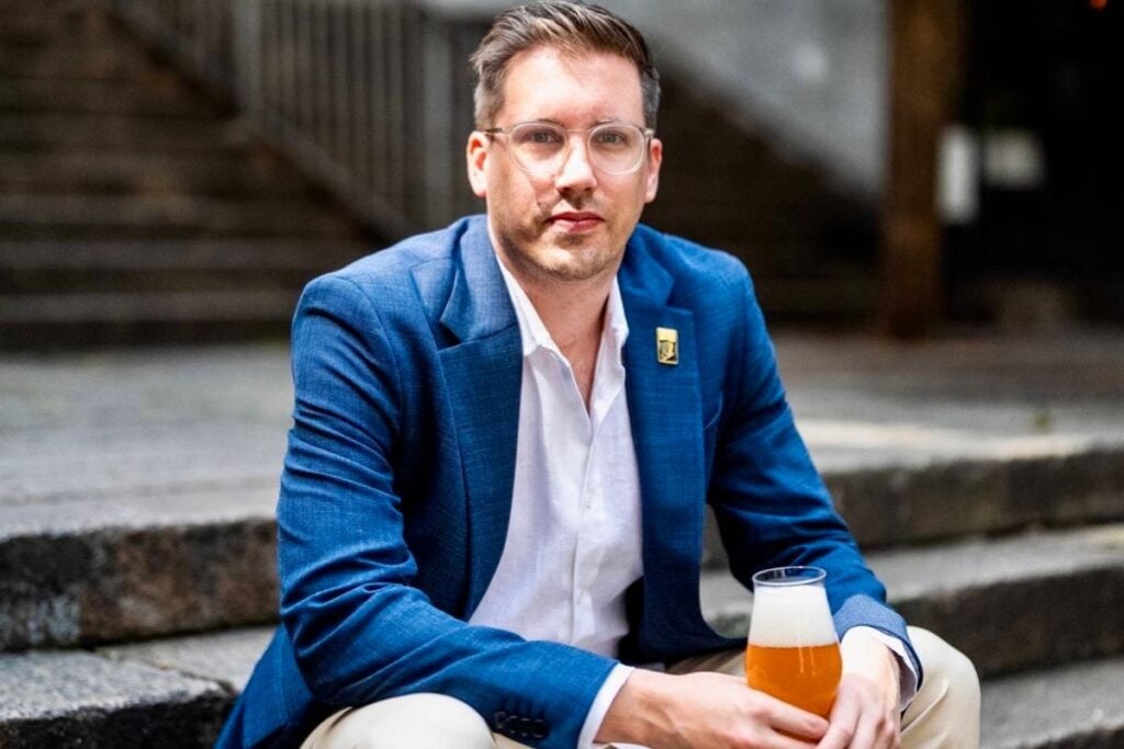 Hong Kong beer sommelier Andrew Munns is educating the city on all things great craft beer Hong Kong beer sommelier Andrew Munns sitting on Shin Hing Street